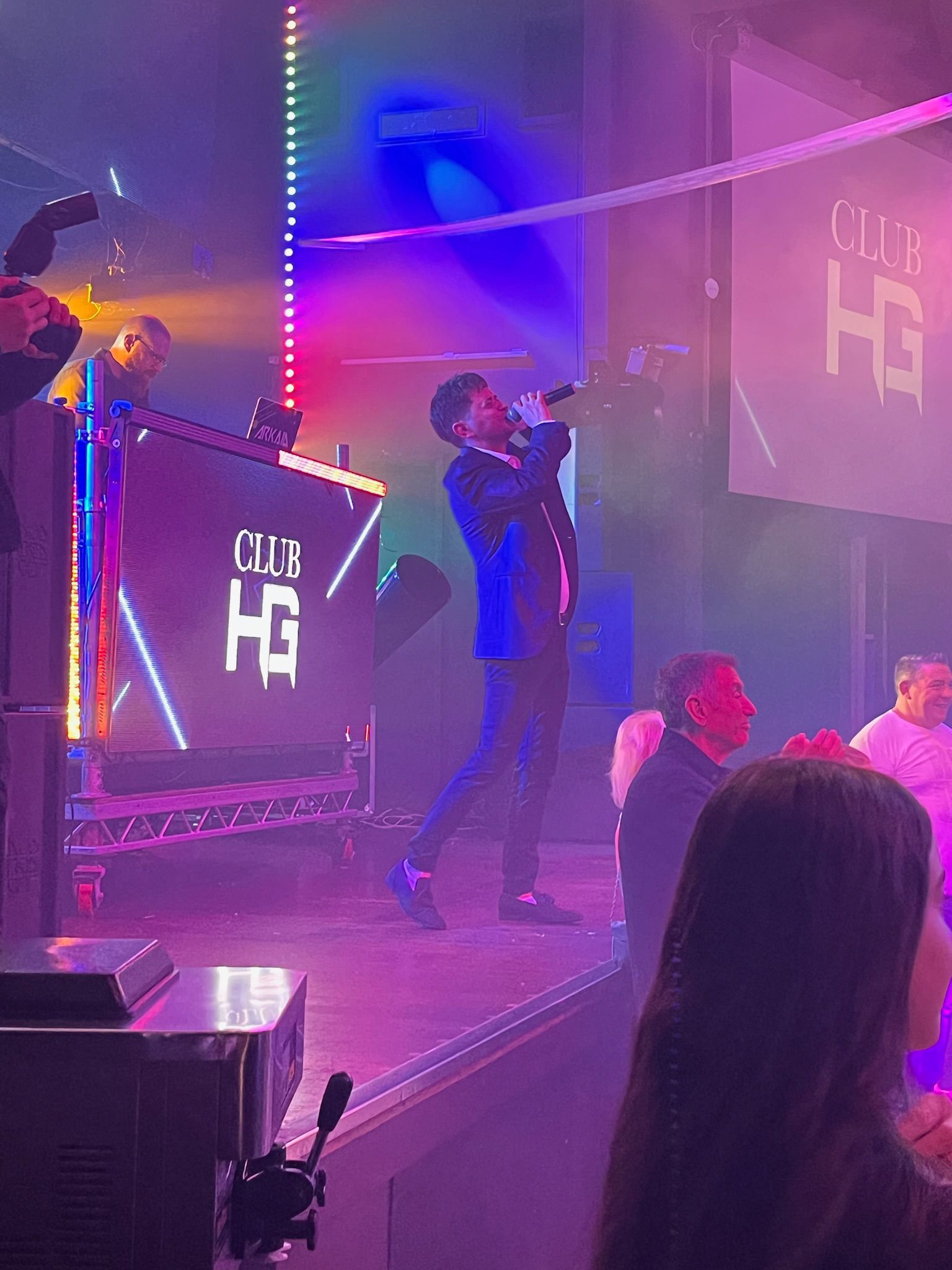 Ilan singing live at a celebration
